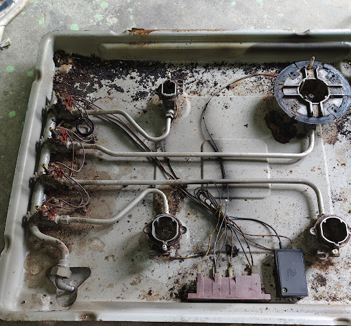Gas stove wiring and burner assembly repair